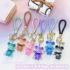 Ins Internet Popular Lindo Tejido Arcoíris Conejo Resina Muñeca Cuerda de Mano Personalizado Pareja Mochila Llavero Colgante Suministro