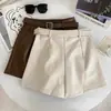 Shorts de couro PU femininos 2026 outono e inverno novo design senso retrô versátil cintura alta modelador peça externa calça de bota com cinto