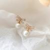 Aretes de Lazo Aretes de Perlas Aretes de Aguja de Plata de Alta Gama Otoño e Invierno Venta Caliente Transfronteriza para Mujer Puesto Mayorista de Yiwu