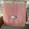 Comercio exterior nuevo estilo bufanda de lana tejida de color liso otoño e invierno nueva versátil para estudiante pareja cálida bufanda larga venta al por mayor