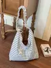Bolsa de mano rayada transfronteriza para mujer, nueva moda de verano 2026, bolsa escolar grande para estudiantes, bolso de hombro y cruzado