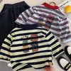 Camisa Polo Infantil 2026 Producto Nuevo de Otoño: Camiseta de Rayas para Niños y Niñas Jóvenes, Camiseta Base con Estampado de Oso de Moda, Moderna