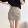 Estilo Inverno 2025 Nova Saia de Lã Pequena Cheirosa para Mulheres Cintura Alta Aparência Emagrecedora Saia Lápis no Quadril Saia Curta Anti-Exposição
