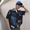 Estilo Hong Kong 2024 Verano Nuevo Camisa Floral de Manga Corta Holgada Estilo Japonés Camisa Floral Hawaiana de Playa para Hombre Tendencia