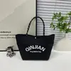 Bolso de Mano de Moda y Estilo 2026 Primavera Nuevo Bolso Tote de Gran Capacidad Personalizado Casual Simple para Mujer