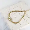 Moda de verão europeia e americana, fofo, estilo doce, temperamento, concha de aço inoxidável, pingente de borboleta, conjunto de colar, pulseira e brinco