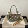 Bolso de mano vintage para mujer, nuevo y popular, de gamuza 2026, bolso cubo exquisito, bolso cruzado de lunares simple y de nicho, moderno