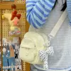 Bolsa pequeña estilo japonés de verano para mujer 2026 nuevo modelo multibolsillos ligera bandolera para caminar y ocio bolsa para teléfono móvil bolso de hombro