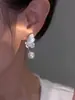 Pendientes de perlas de mariposa azul de alta calidad con diseño de nicho para mujer, nuevos y populares pendientes de moda de verano 2023.