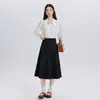 Outono/Inverno 2026 Novo Conjunto de Duas Peças Feminino Estilo Francês Manga Longa Solto Branco Versátil Camisa e Saia Tendência