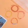 Pulsera tejida de letras nuevas, pulsera popular de cuentas de cuatro piezas, joyería de colores caramelo europea y americana al por mayor