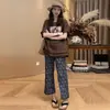 Conjunto de moda para mujer 2026 verano nuevo estilo, top holgado de manga corta de moda con pantalones de pierna ancha estampados, conjunto de dos piezas casual