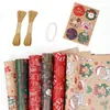 Suministro Transfronterizo de Papel de Regalo Navideño, Papá Noel, Copos de Nieve, Cascabeles, Fruta de la Paz, Flores, Papel de Regalo