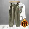 Marca de moda japonesa calça de trabalho folgada de inverno calça harém costura tridimensional botão lateral forrada de fleece espessada calça de moletom casual masculina