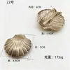 Estilo de lujo ligero, hebilla de cinturón de metal con forma única, serie oceánica, hebilla irregular, decoración para trajes de baño y ropa, accesorios de metal
