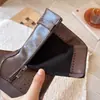 Botas de media caña para niña con hebilla de cinturón negra 2026 Otoño Nuevo Estilo Británico Cremallera tallada Suela suave cómoda Botas Martin