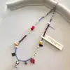 Collar de Cuentas Semilla Klein Blue Tendencia Nacional con Diseño Único y Colgante de Elefante Pequeño Choker