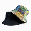 Sombrero de cubo de doble cara con estampado de piña de dibujos animados, superventas transfronterizo para hombres y mujeres, sombrero de protección solar para ocio al aire libre