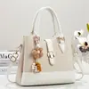 Bolso de cubo de mano para mujer de alta calidad, nuevo bolso de hombro retro casual 2026, bolso cruzado para el trabajo