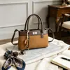 Bolso retro de alta calidad con diseño de nicho para mujer, nueva colección 2026, bolso versátil de moda transfronterizo, bolso de hombro y bolso tote