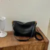 Bolso de mano retro casual para mujer para comercio exterior, nuevo estilo minimalista de otoño, lujo ligero, bolso de hombro de solapa de alta gama