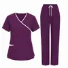 Bestseller transfronterizo Amazon uniforme de trabajo para doctor enfermera bata quirúrgica multibolsillos secado rápido poliéster conjunto de uniforme médico