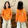 Camiseta Base de Dibujos Animados para Niñas Primavera/Otoño 2026 Ropa Interior Nueva Elegante Estilo Coreano Camiseta de Manga Larga para Niña