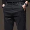 Pantalones Casuales Gruesos para Hombre Otoño/Invierno 2025 Estilo Nuevo Cálidos Elásticos Ajustados Negocios de Alta Gama Versátiles para Hombre