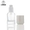 Novo em Estoque Frasco Redondo Reto de 30ml para Base Líquida, Frasco de Vidro Transparente com Bomba de Loção, Material de Embalagem para Frasco de Creme de Base e Protetor Solar para Sub-Embalagem