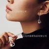 Nuevos y elegantes pendientes de perla tipo calabaza con borlas y montura calada para mujer, pendientes de alta gama, elegantes y a la moda al por mayor