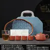 Juego de té de arcilla púrpura, que incluye una tetera y cuatro tazas, un juego de regalo de alta gama para uso doméstico, adecuado para ocasiones de negocios y se puede personalizar con un logotipo