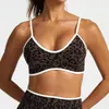 Conjunto de yoga europeo y americano sin costuras con estampado de leopardo transfronterizo, ropa de fitness ajustada que levanta los glúteos, sujetador deportivo sin espalda y pantalones de yoga