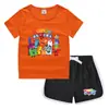 Conjunto de Camiseta e Shorts de Gola Redonda de Verão 2026 para Crianças Estilo Coreano Casual Absorvente de Suor Cor Doce Conjunto de Moletom para Crianças Pequenas