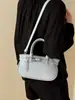 Moda Primavera 2026 Versátil Bolsa de Mão Elegante e Moderna Bolsa de Ombro Transversal com um Toque Vintage de Alto Padrão
