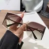 Novos óculos de sol sem aro com lente curva e armação grande para mulheres, metal de alta qualidade, personalidade, óculos de sol de menina doce, transfronteiriços Europa e Estados Unidos