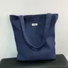 Bolsa de Lona de Mezclilla para Hombres y Mujeres Gran Capacidad 2025 Nueva Bolso de Hombro Tote para el Trabajo y Ropa de Trabajo Relajado Bolso de Mano de Alta Gama