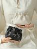 Un lote de metralla, bolsa de cosméticos, bolsa de lápiz labial, bolsa de almacenamiento, monedero, bolsa de forro, bolsa de cosméticos, bolsa pequeña portátil