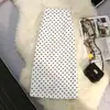 Falda midi de lunares negros para mujer, nueva colección primavera/verano, de cintura alta, adelgazante, ajustada al cuerpo, con abertura y diseño de línea A