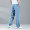 Calça Jeans Tencel Xintang Guangzhou para Homens, Novo Estilo Outono, Calça Reta Solta Azul Claro, Calça Masculina de Seda Gelada, Super Nova