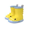 Botas de lluvia de tiburón de venta caliente transfronterizas para niños, venta al por mayor de comercio exterior, zapatos de agua ligeros antideslizantes para niños y niñas en la temporada de lluvias, adecuados para estudiantes de jardín de infantes