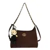 Bolso hobo cadena estilo 2026 inspirado en Chanel con patrón de diamantes, bolso de hombro de cuero encerado retro, bolso tote versátil