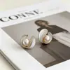 Pendientes de Imitación Perla Esmaltada Estilo Francés de Alta Gama Transfronterizos Yanbai, Lujo Ligero, Exquisitos, Sencillos, Elegantes, Tachuelas de Diseño de Nicho