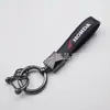 Llavero popular transfronterizo con logo de coche, colgante de alta gama con logo de coche, accesorios de llavero para motocicletas y vehículos eléctricos