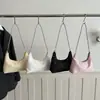 Modelo Nuevo Primavera 2026 Lentejuelas de Estrella Moda de Alto Estilo Bolso Casual Versátil Simple de Gran Capacidad para Hombro o Axila