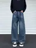 Jeans Masculino Retro Americano com Cordão e Corte de Foice Desconstruído Lavado Vibe Patchwork Solto Perna Reta Caimento High Street Calça Longa