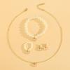 Joyería europea y americana traje moda temperamento personalidad gota de aceite negro collar de mariposa aretes de botón anillo pulsera 4 piezas accesorios