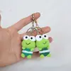 Creativo Dibujo Animado Tejido a Mano Lindo Rana de Ojos Grandes Colgante Crochet de Lana Llavero Colgante Mini Muñeca