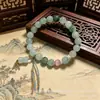 Pulsera de Jade Dorado de Xinjiang al por Mayor Accesorios de Cuentas Redondas de Jade del Gobi Pulsera Unisex de Jade Verde de Tianshan Fuente de Suministro para Transmisiones en Vivo