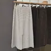 Saia de tricô listrada estilo francês com fenda traseira para mulheres, nova saia reta casual elegante versátil de cintura elástica para outono e inverno