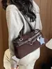 Bolso tipo baguette de un solo hombro con diseño de nicho estilo coreano y decoración de cinturón, nuevo y moderno bolso para el antebrazo, bolso de mano y bolso cruzado versátil para mujer